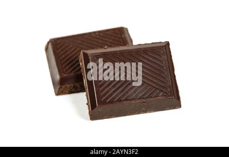 Pair of dark piece broken chocolate bar isolated on white macro view Stock Photo