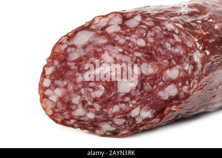 Macro view of Salami smoked sausage stick isolated on white background Stock Photo
