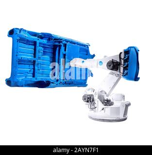 Isolated industrial robotic automatic arm works with car steel frame, the concept of modern technology in the factory. Stock Photo