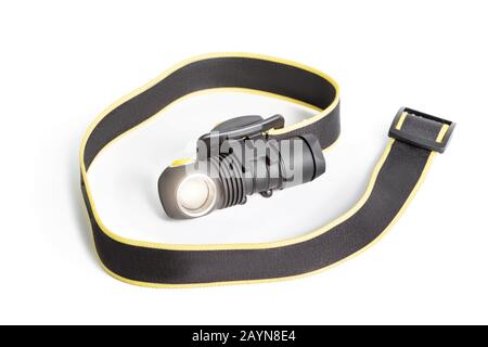 Head lamp flashlight with light beam studio shot Stock Photo