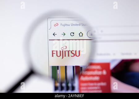 Saint-Petersburg, Russia - 18 February 2020: Fujitsu company website page logo on laptop display. Screen with icon, Illustrative Editorial Stock Photo