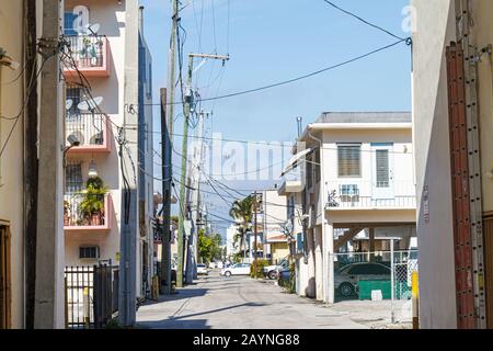 Miami Beach Florida,alley,buildings,city skyline cityscape,utility poles,lines,visitors travel traveling tour tourist tourism landmark landmarks cultu Stock Photo