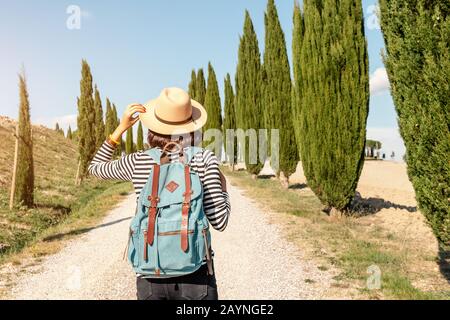 Vacation and travel in famous cypress alley, Tuscany and Italy tourist destination Stock Photo