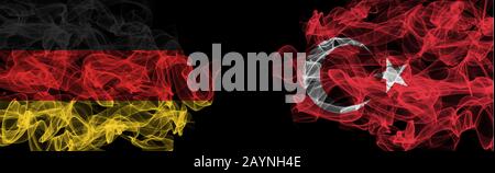 Flags of Germany and Turkey on Black background, Germany vs Turkey Smoke Flags Stock Photo