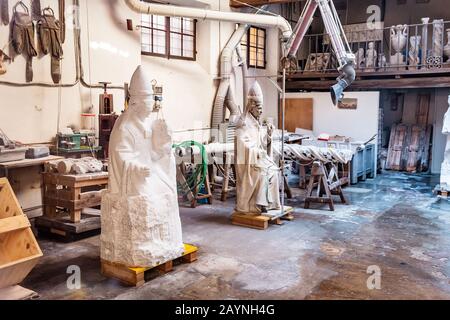 19 OCTOBER 2018, FLORENCE, ITALY: restoration of ancient medieval religious statues in the workshop Stock Photo