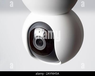 Close-up Wireless surveillance camera isolated on white background, a Concept of a home surveillance and intrusion protection system Stock Photo