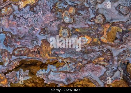 ICorroding, pitted  metal surface due to coastal influence. Stock Photo