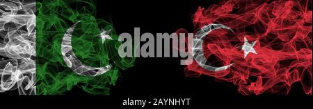 Flags of Pakistan and Turkey on Black background, Pakistan vs Turkey Smoke Flags Stock Photo