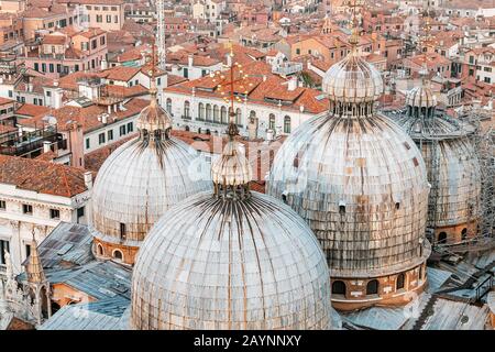 Aerial View of the domes of St Mark Basilica in Venice. Travel destination concept Stock Photo