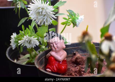 Cute little Buddha Stock Photo - Alamy