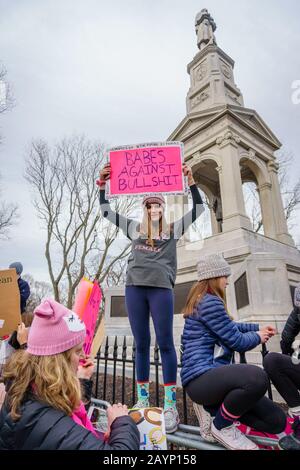January 20, 2018-Cambridge, MA, USA- Young teenage girl holds protest sign at the First Anniversary of the Women's March. Stock Photo
