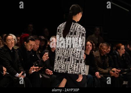 Models on the catwalk for the Chalayan show during London Fashion Week February 2020 show at Sadlers Wells Theatre in London. Stock Photo