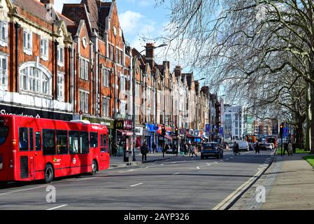 A busy Uxbridge Road on Shepherds Bush Green West London England UK Stock Photo