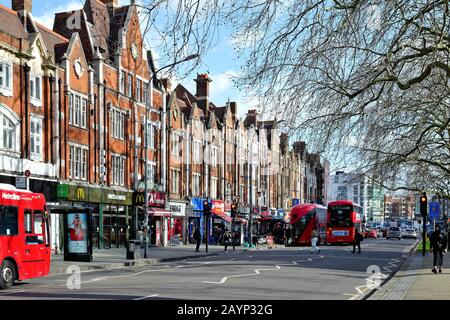 A busy Uxbridge Road on Shepherds Bush Green West London England UK Stock Photo