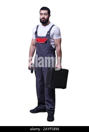 smiling worker with red drill on white background Stock Photo