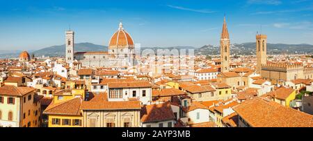 Panoramic aerial shot from viewpoint of the classical view to the most famous Florence landmarks at sunny day. Travel in Italy concept Stock Photo