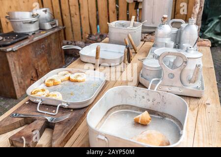 Cooking food in army field kitchen Stock Photo