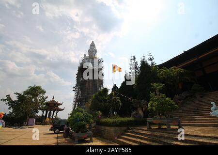 Giant Buddha statue under renovation outside Linh An Pagoda in Da lat Vietnam which open and free to both local and foreign tourist Stock Photo