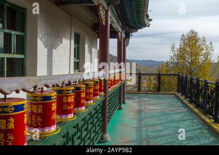 Prayer wheels on the outside of the Ariyabal Meditation temple in Gorkhi Terelj National Park which is 60 km from Ulaanbaatar, Mongolia. Stock Photo