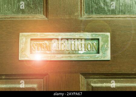 Handwriting text writing Stem Education. Conceptual photo develop to prepare primary and secondary students for college Old retro mailbox on the woode Stock Photo