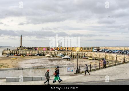 The harbour arm at Margate at low tide on a fine winter's day. Stock Photo