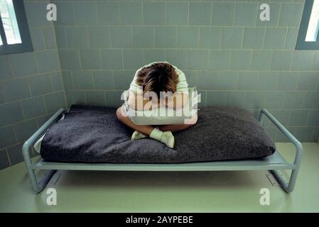 Austin, Texas: Inmate (model) in juvenile detention center cell. ©Bob Daemmrich Stock Photo