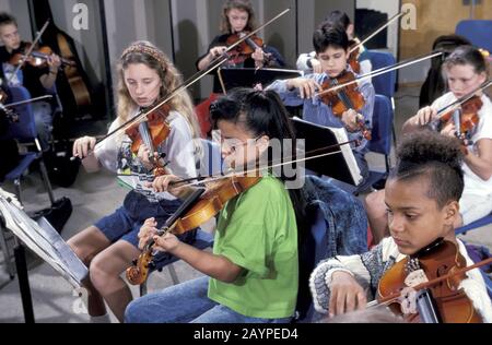 Austin, Texas: Fulmore Junior High School orchestra practice. ©Bob Daemmrich Stock Photo