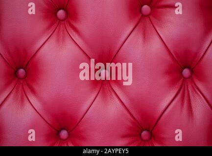 Background of red leather furniture upholstery Stock Photo