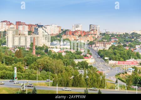 01 JULY 2018, UFA, RUSSIA: City view of urban transport traffic at Friendship Monument in Ufa town Stock Photo