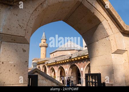 HACI BEKTAS, TURKEY - AUGUST 25: Old woman visiting at famous mosque of Haci  Bektas Veli and behind writes the rules of humanity on August 25, 2013 in  Nevsehir, Turkey Stock Photo - Alamy