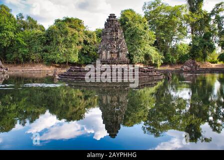 Neak Poan is an artificial island with a Buddhist temple on a circular island in Jayatataka Baray Stock Photo