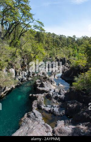 The Petrohue River in Vicente Perez Rosales National Park near Puerto Varas and Puerto Montt in the Lake District in southern Chile. Stock Photo