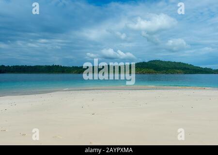 The white sand beach of the small island of Granito de Oro in Coiba National Park in Panama. Stock Photo