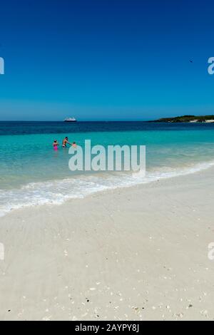 Cruise ship Safari Voyager at anchor in front of the white sand beach on Iguana Island in Panama. Stock Photo