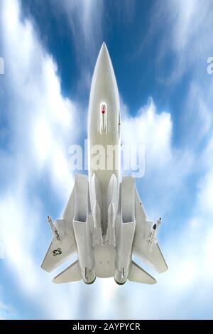 A low angle view of a F-14 US Naval fighter plave in flight Stock Photo