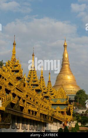The southern stairway of the 2,500 years old Shwedagon Pagoda in Yangon (Rangoon), the largest city in Myanmar. Stock Photo