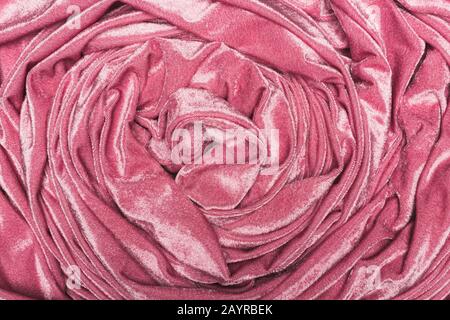 Top view of background of twisted pink velvet cloth Stock Photo