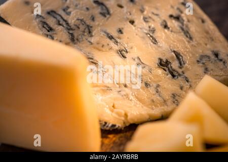close up view of Grana Padano and Dorblu cheese Stock Photo