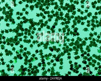 Saint Patricks Day with shamrocks on green background in filled frame format Stock Photo