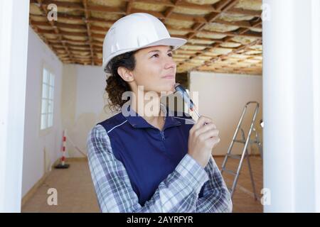 a woman is thinking about something Stock Photo