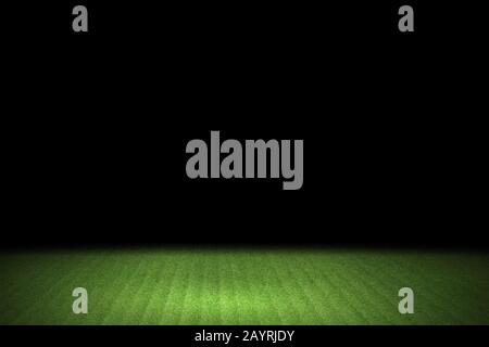 Light shining down on green concrete floor in dark room with copy space, abstract background Stock Photo