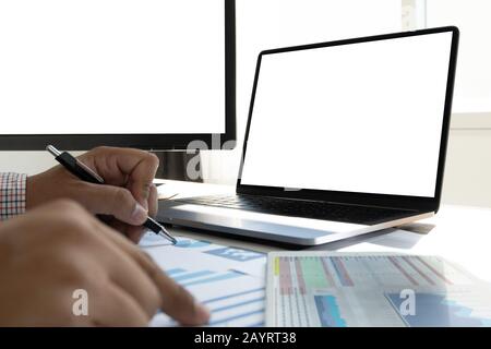man Using laptop with blank screen work on Blank screen computer Cloud computing Stock Photo