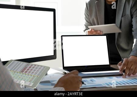 man Using laptop with blank screen work on Blank screen computer Cloud computing Stock Photo