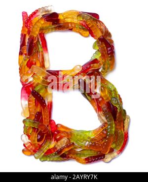 Letter B of the English alphabet  from multi-colored chewing marmalade on a white isolated background. Food pattern made ffrom children's sweets snake Stock Photo