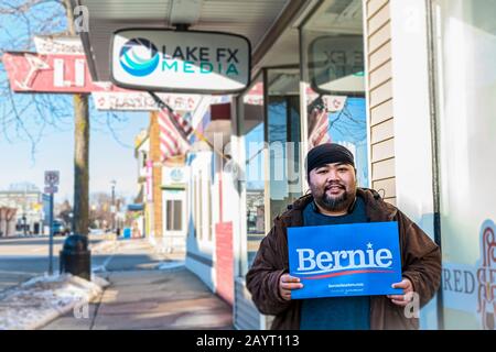 Ludington, Michigan, USA.  16 February 2020. Bernie Sanders supporter holding sign at the Meet-up in downtown Ludington, Michigan today.  Credit, Jeffrey Wickett/Alamy Live News. Stock Photo