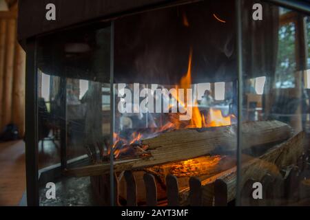 Interior with fireplace of Chelinda Lodge on the Nyika Plateau, Nyika National Park in Malawi. Stock Photo