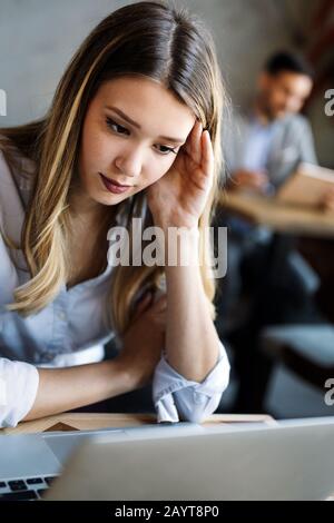 Programmers working in a software developing company office Stock Photo