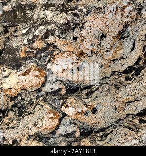 Spectacular granite texture with contrast pattern. Seamless square background, tile ready. Stock Photo