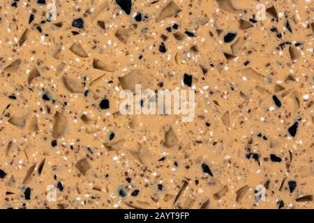 Pattern of decorative beige stone wall surface. Stock Photo