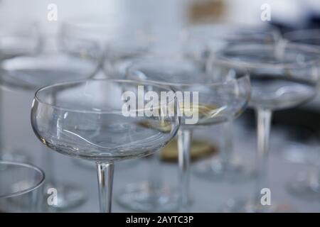 lots of luxurious champagne glasses and blurred background Stock Photo